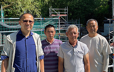 Hu Xiaojun und sein Team von Gartenbauexperten